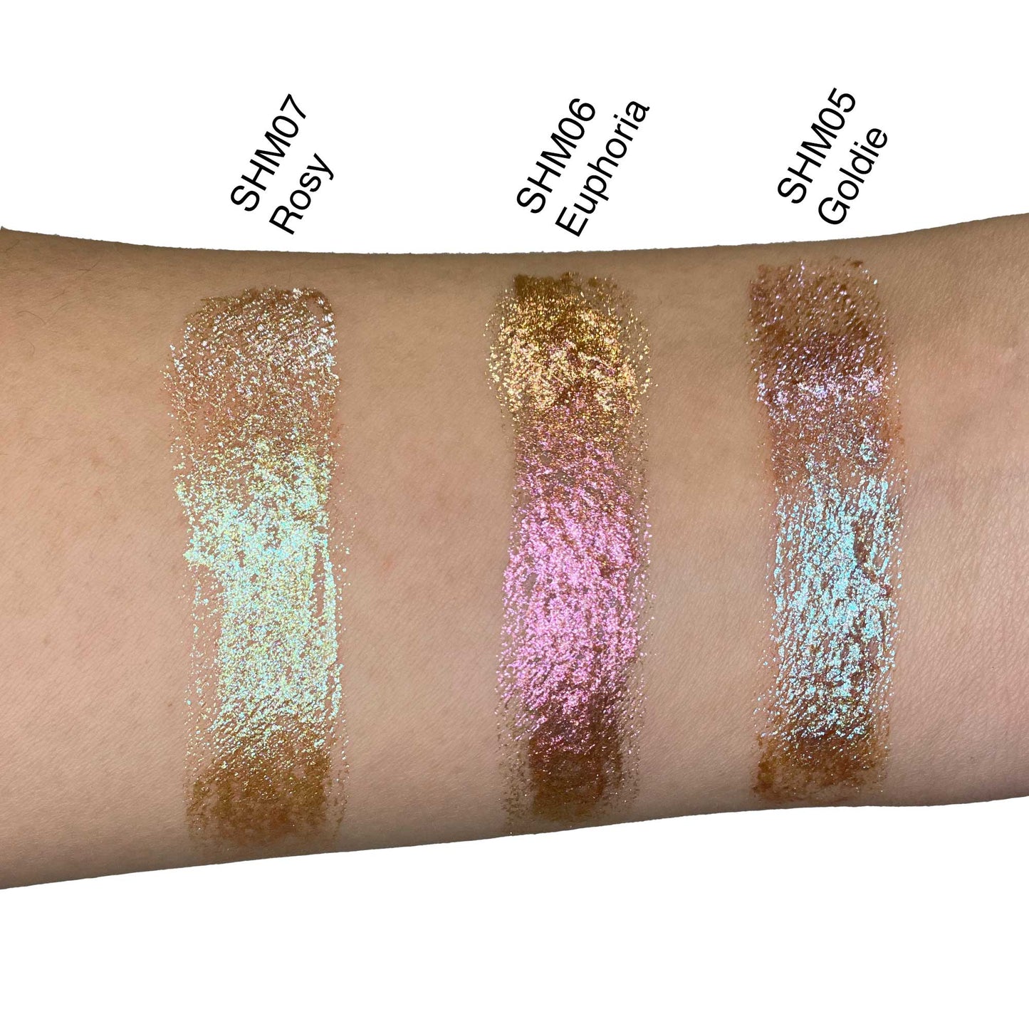 VOUGEA Luxe Liquid Shimmer tube with radiant glow swatched across lips, eyes, and cheekbones