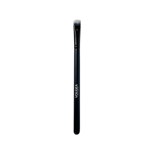 VOUGEA Luxe Packing Eye Brush with dense synthetic bristles on blush pink background