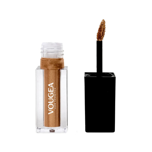 VOUGEA Luxe Liquid Shimmer tube with radiant glow swatched across lips, eyes, and cheekbones