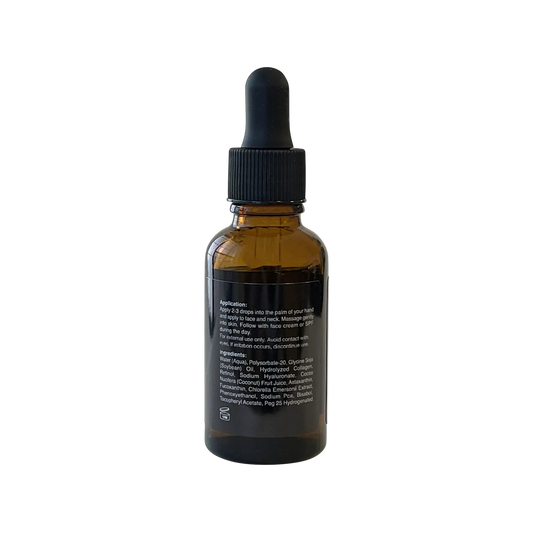 VOUGEA Luxe Collagen + Retinol Serum in glass dropper bottle with golden accents on soft blush background