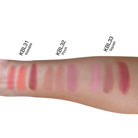 VOUGEA Luxe 3-Shade Blush Palette in sleek compact with matte powder shades displayed on blush pink background