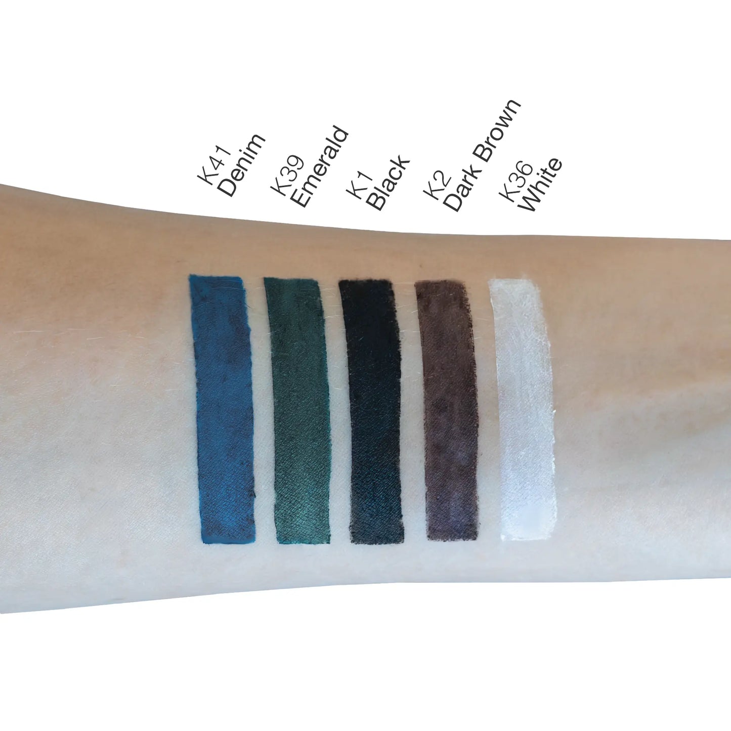 VOUGEA Luxe Khol Eyeliner pencil with creamy texture displayed on charcoal gray background
